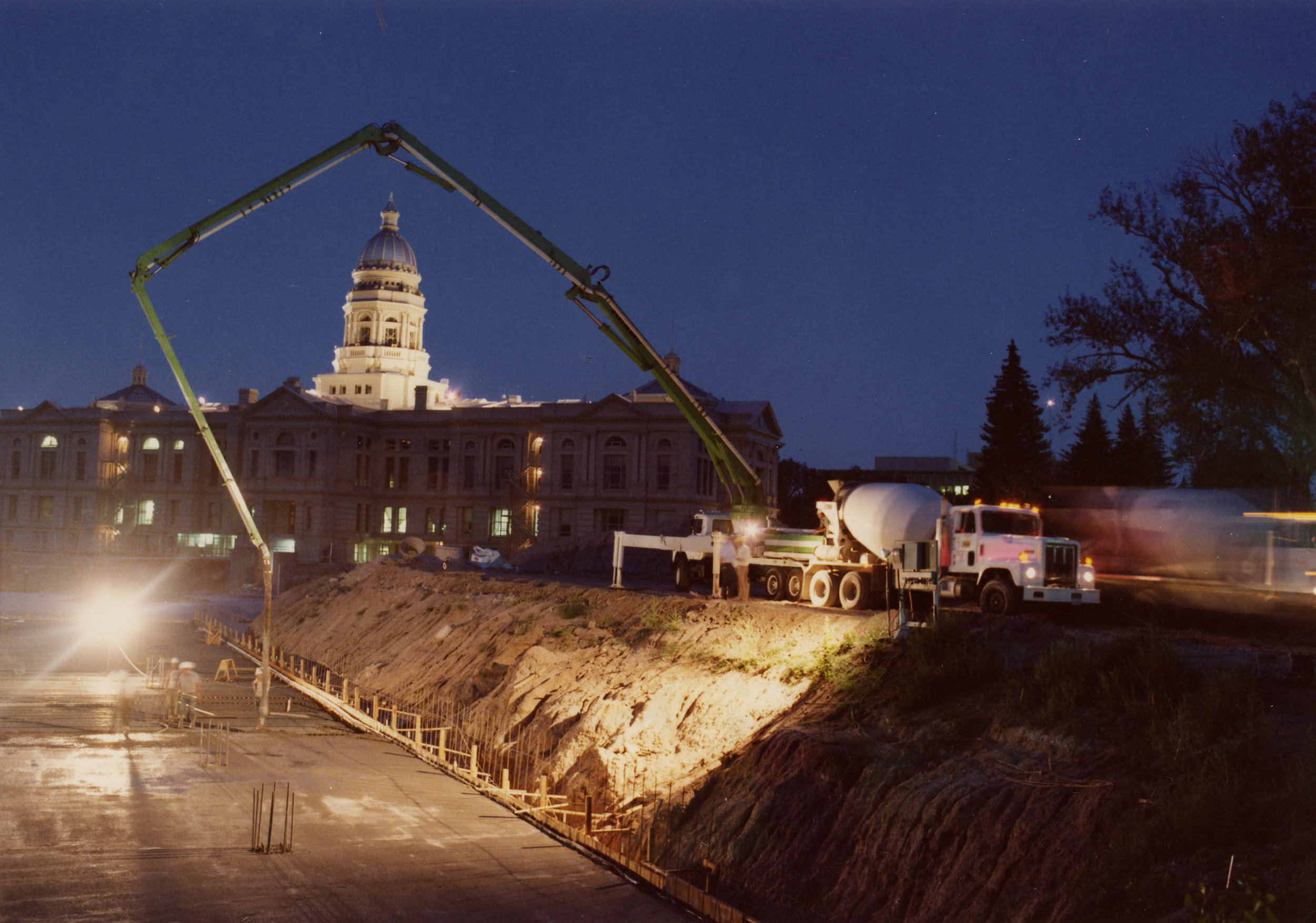 A 1981 photo of pouring the concrete foundation for the Herschler with the concrete pump truck.