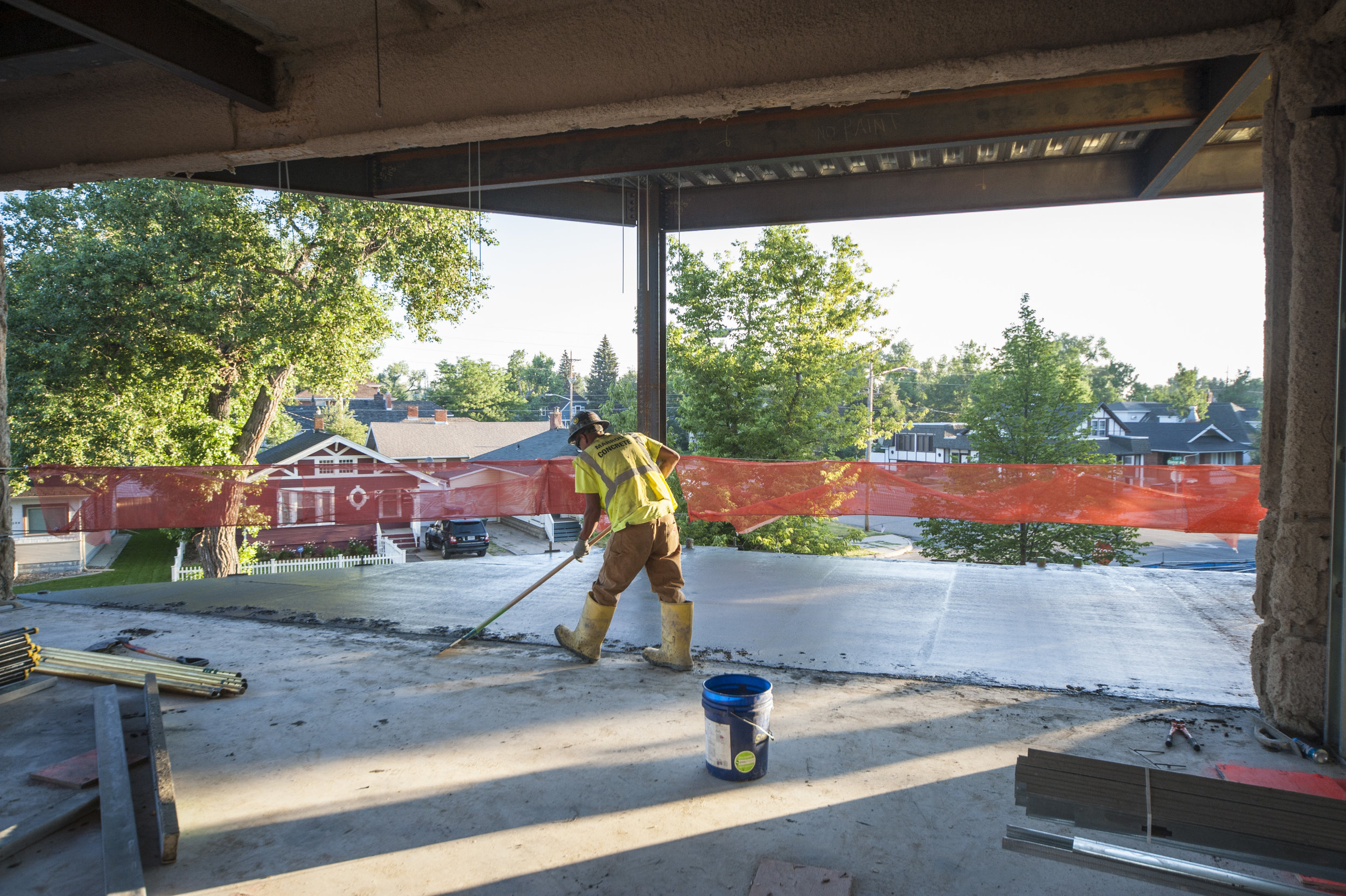 Freshly poured concrete glistens in the morning sun. The expansion extends the Herschler Building by 15 feet on its southern face.