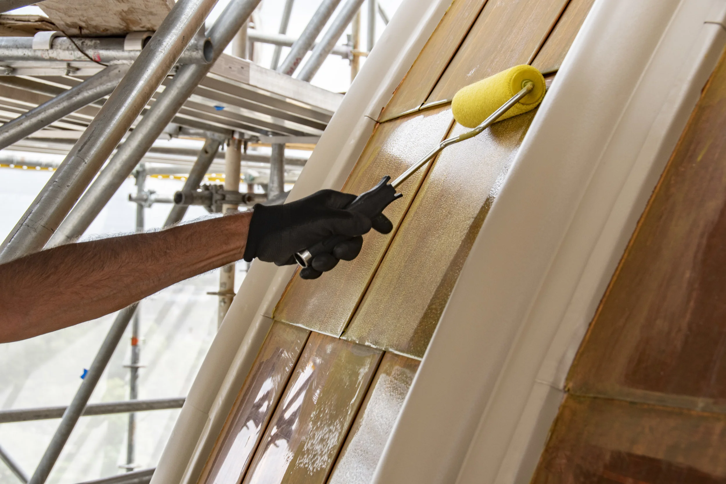 Preparing to gild the dome