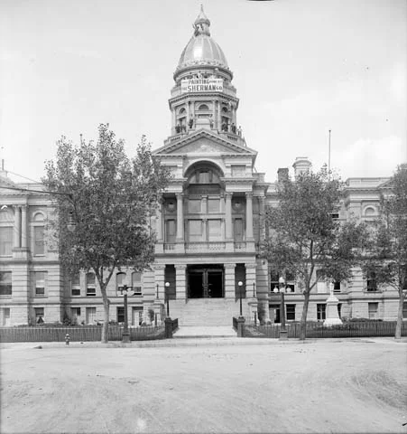 Tuttle & Hawes gilded the dome with 22-carat gold leaf for the first time in 1900. The dome has been gilded five other times before this restoration project. In this photo, circa 1915-1916, painters from the Sherman Company stand around the base of the dome. Photo courtesy of the Wyoming State Archives.