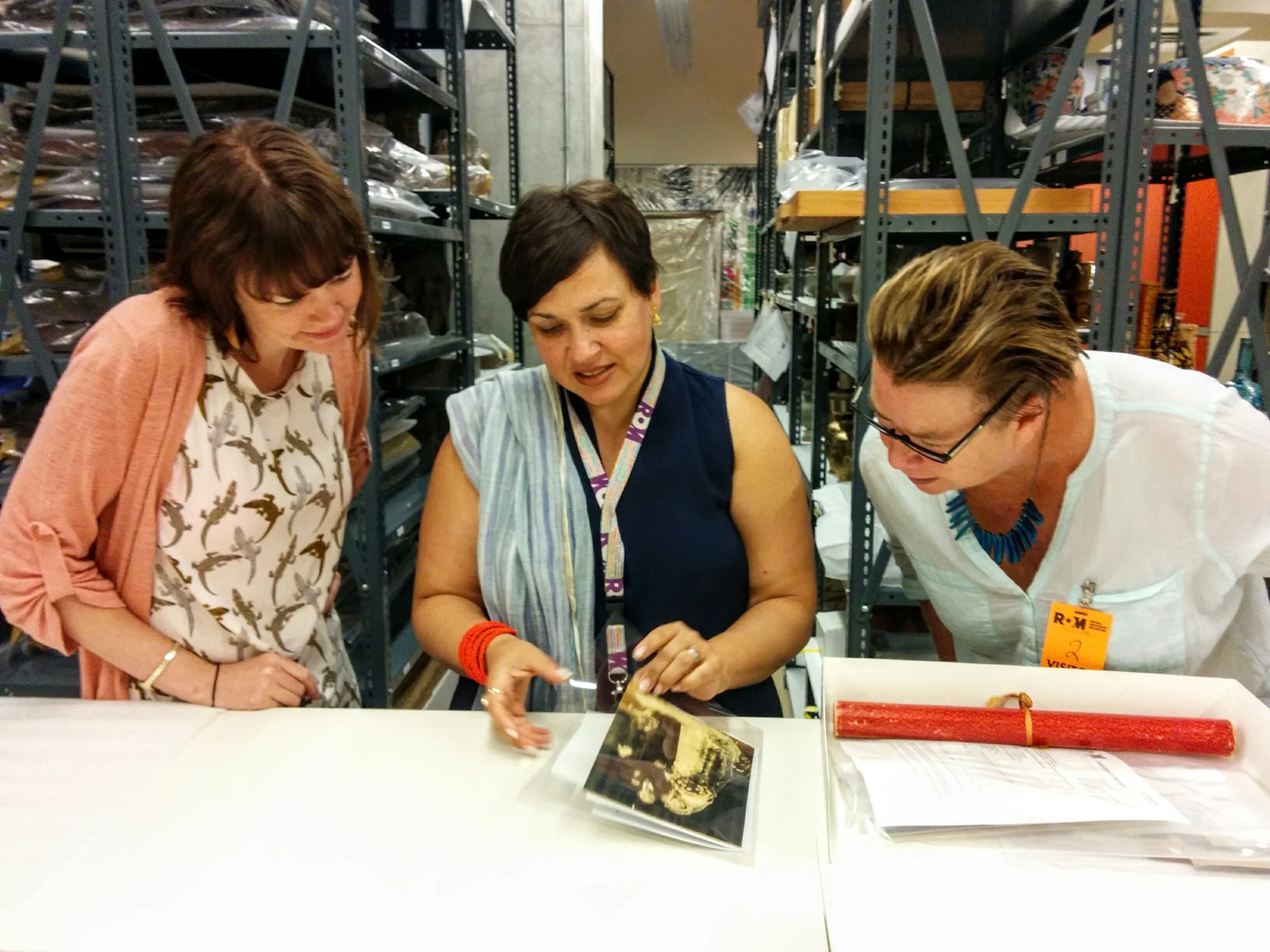 Julienne Pascoe consulting with Deepali dewan and Elspeth Brown at ROM (J. Orpana, 2017)