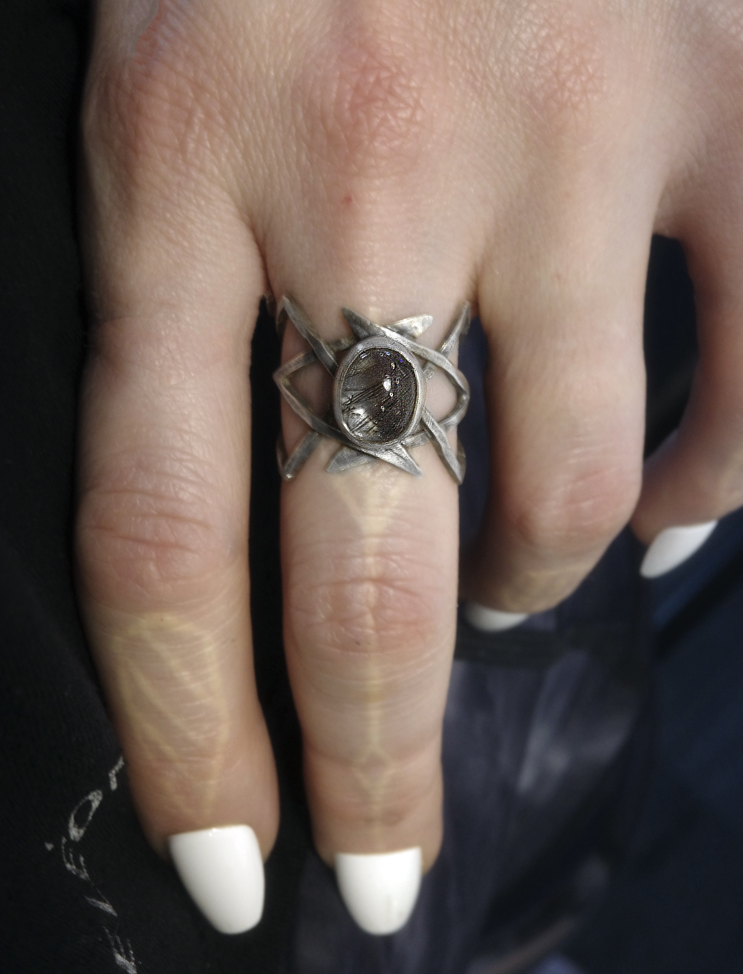 rutilated quartz lattice ring worn.png