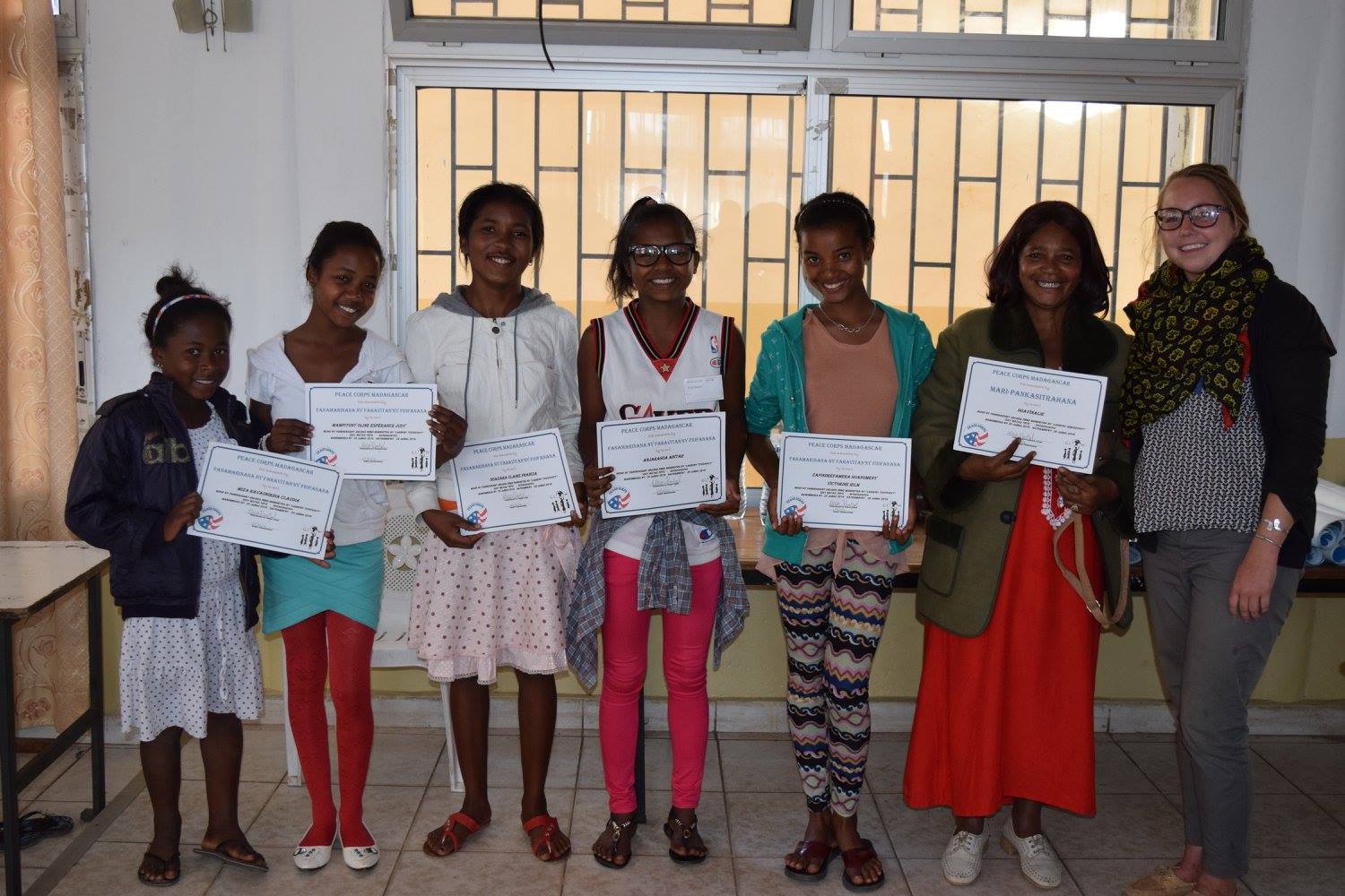 Claudia, Oline, Francia, Anitah, Victorine and Soavinalie, our community chaperone with their certificates at the closing ceremony. 