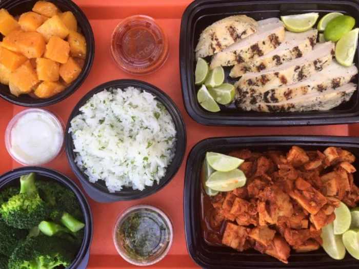 Protein: Citrus Chicken, Adobo Chicken (chopped) Sides: Butternut Squash Saute, Steamed Broccoli, White Rice Pilaf. Sauces: Hot Molcajete Salsa, Chimmicurri, Garlic Toum