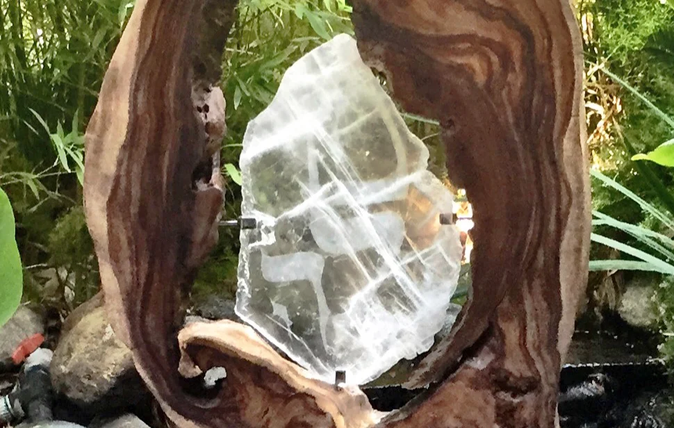 Sharing The Flame_Hand-carved Selenite_Acacia Wood_Light_Steel - 57x31x12 in - $1440-2.jpg