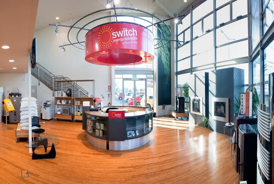 INTERIOR DESIGN / / CATEGORY: COMMERCIAL – Showroom/Sales Office Solid Energy needed a sustainable, exciting look for their new renewable energy business and consultancy service, Switch. / / CONTRACT SCOPE: Design the concept, develop the design, establish budgets, apply for building consent and project-manage the construction of the fitout to completion. / /CLIENT'S RECOMMENDATION: “In 2007 Phil Tindall from Lucid Commercial Design was contracted by Solid Energy New Zealand Limited to assist with the creative design and fit out of a new show room for our Switch business to display heating products. We soon realised that we were very fortunate to have chosen Phil for this job, as it became evident that there was more to this project than first envisaged. Phil quickly recognised the need for overall project management, and took this role over in a very competent and professional manner. He took responsibility for what needed to be done, and only sought direction and authority from us on important matters. Phil's skills and experience were soon recognised by our Nature's Flame subsidiary who was outfitting an office and retail showroom in the same complex at the same time. Phil has a good creative eye, but also understands the customers' needs. We virtually accepted all of his recommendations in terms of his design and layout, and are very pleased with the results. His ability to project plan and ensure deadlines were met within budget was impressive. He liaised with the developers, suppliers and trades people in a calm, considered and professional manner which instilled confidence in all parties. We would certainly utilise Phil's services again if the need arose, and would have absolutely no hesitation in recommending his services to anyone. I am very happy about being contacted directly regarding Phil Tindall.” Duncan Mackenzie Energy Projects Manager Solid Energy NZ Ltd