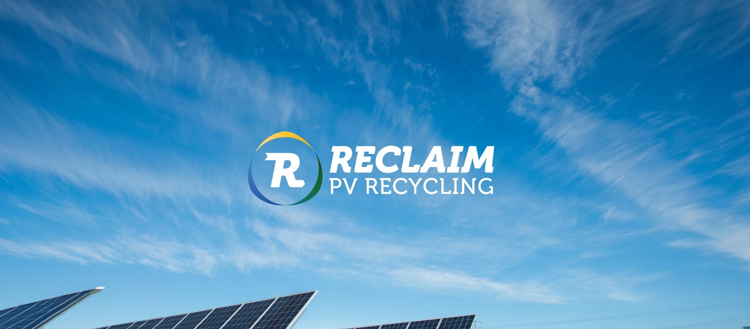 Blue sky with wispy clouds and a logo for RECLAIM PV Recycling, featuring a circular arrow with a blue, yellow, and green gradient surrounding a stylized 'R' and the text 'RECLAIM PV RECYCLING'.