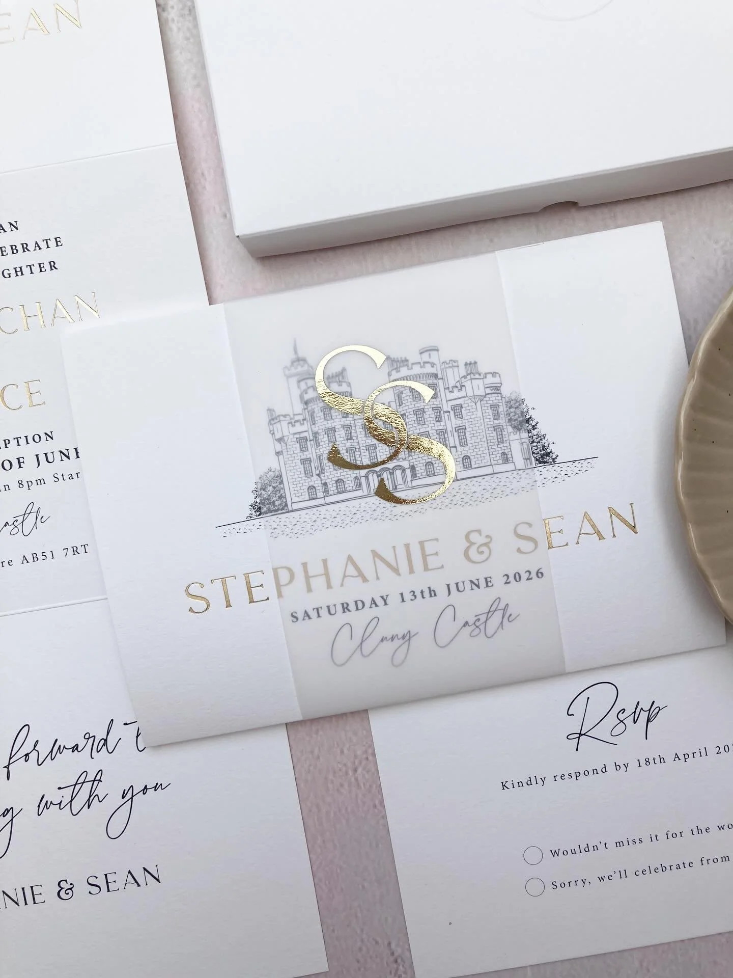 Luxurious boxed invitations with embossing, gold foil and venue drawing of @cluny_castle