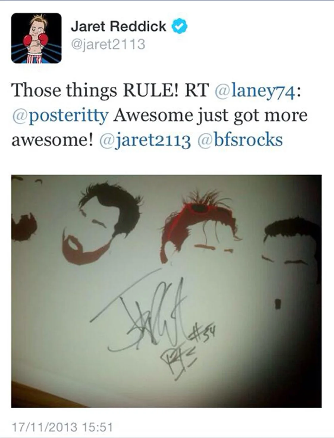 Twitter post from Jaret Reddick featuring a photo of a wall with stylized, colorful portraits of three people with autographs, under a caption praising a concert or event.