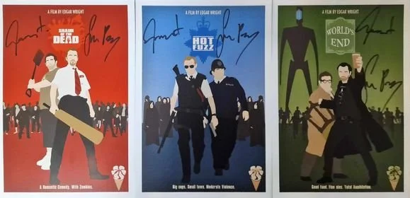Three posters from the 'Kill Bill' movie series, featuring characters with weapons, shown in red, blue, and green backgrounds.