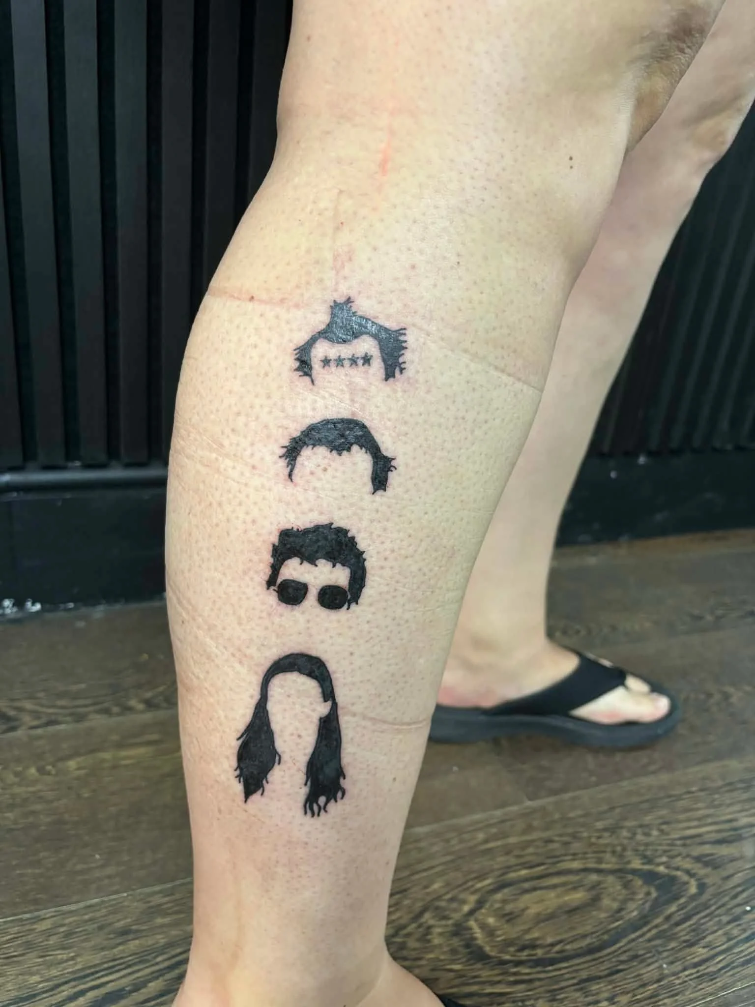 young_ones_Posteritty_Hairstyles_Tattoo_Leg_Customer.JPG