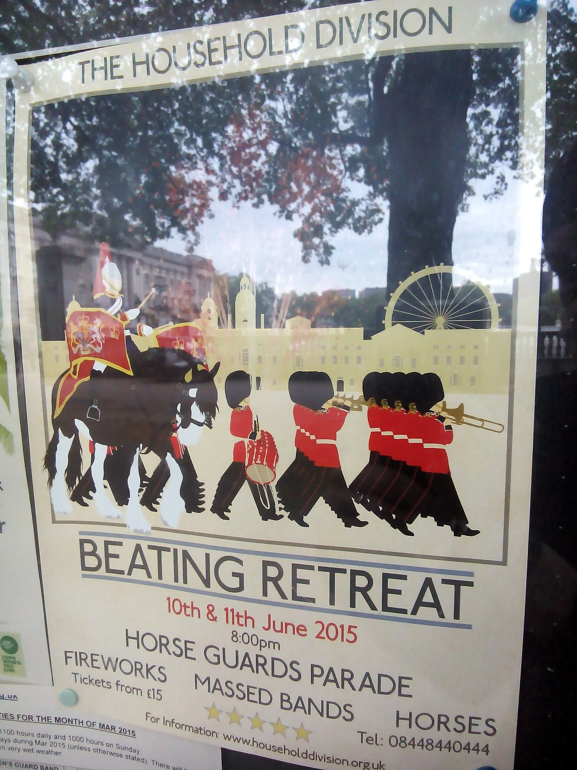 Poster for a Beating Retreat event organized by The Household Division, featuring a silhouette of soldiers on horseback, a large wheel, and a background of a building and trees. The event is scheduled for June 10th and 11th, 2015.