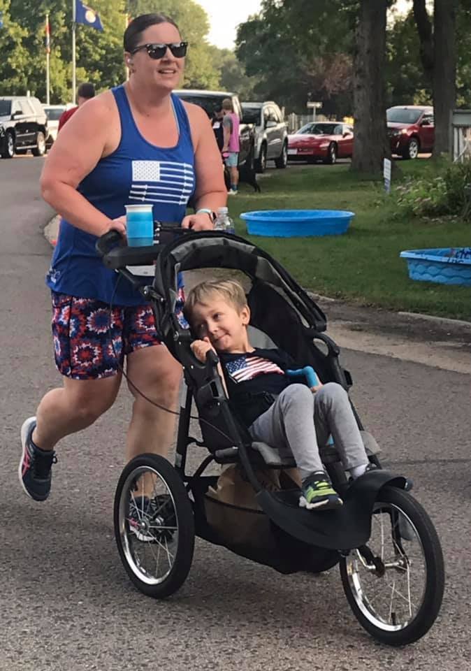 Woman runner and little boy in stroller.jpg