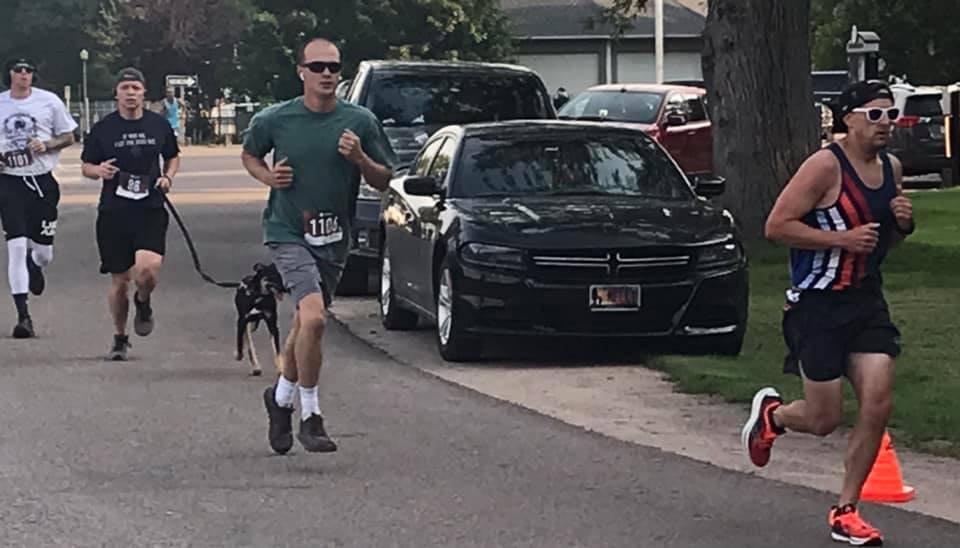 Men and dog running.jpg