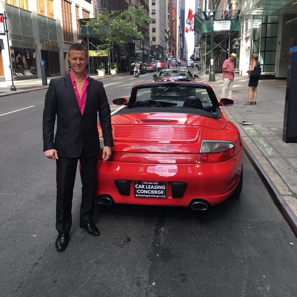 Car Leasing Concierge owner Paul Maloney with one Red Hot Porsche Carrera S!