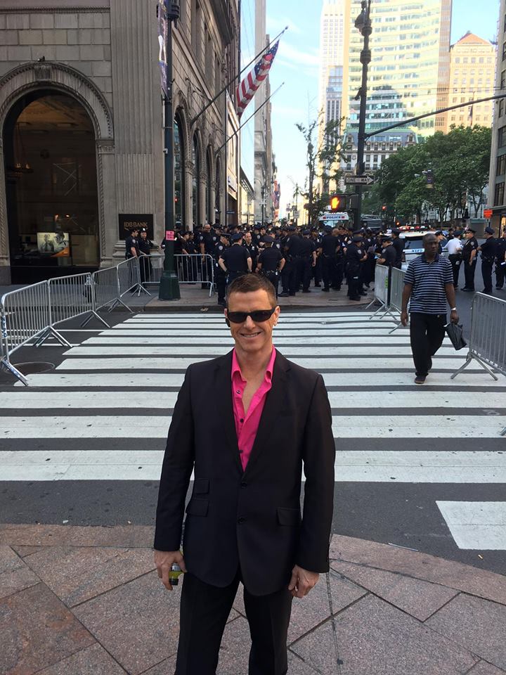 Car Leasing Concierge owner Paul Maloney with an ocean of New York's Finest.