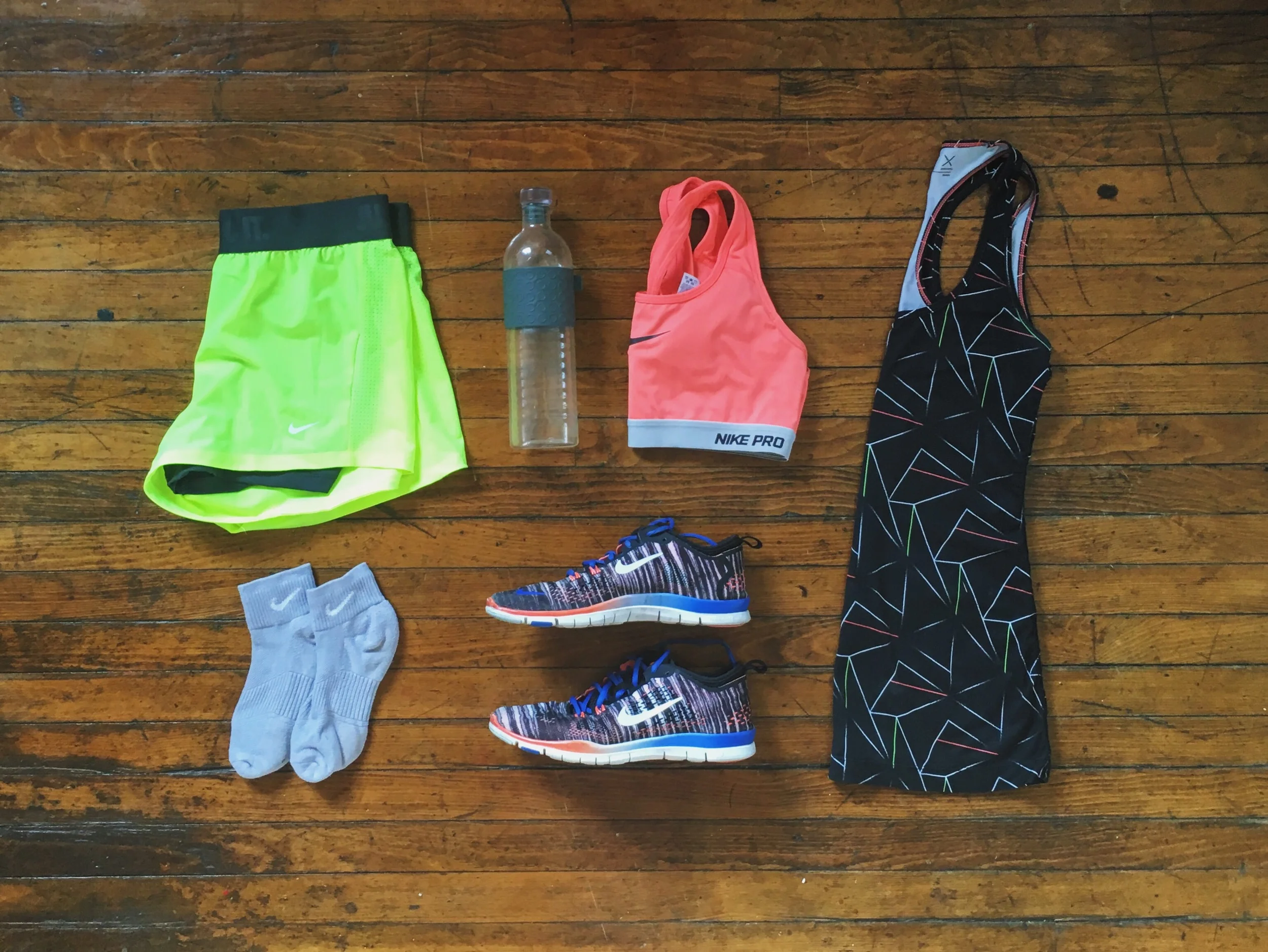 (1) Shorts:Nike (2) Socks:Nike (3) Sports Bra:Nike (4) Shoes:Nike (5) Tank: JC Penny 