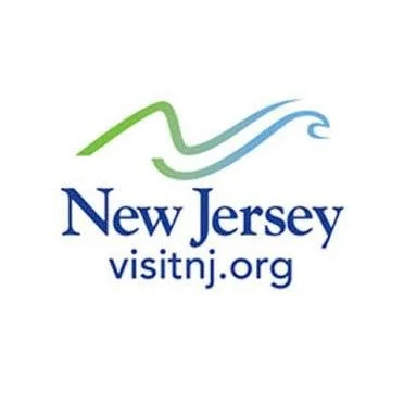 New Jersey tourism logo with a green and blue stylized wave and text 'New Jersey visitnj.org'.