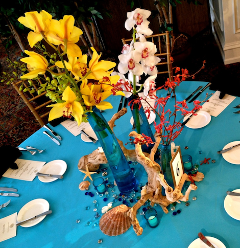 Tropical Floral Centerpiece by Eggsotic Events.png