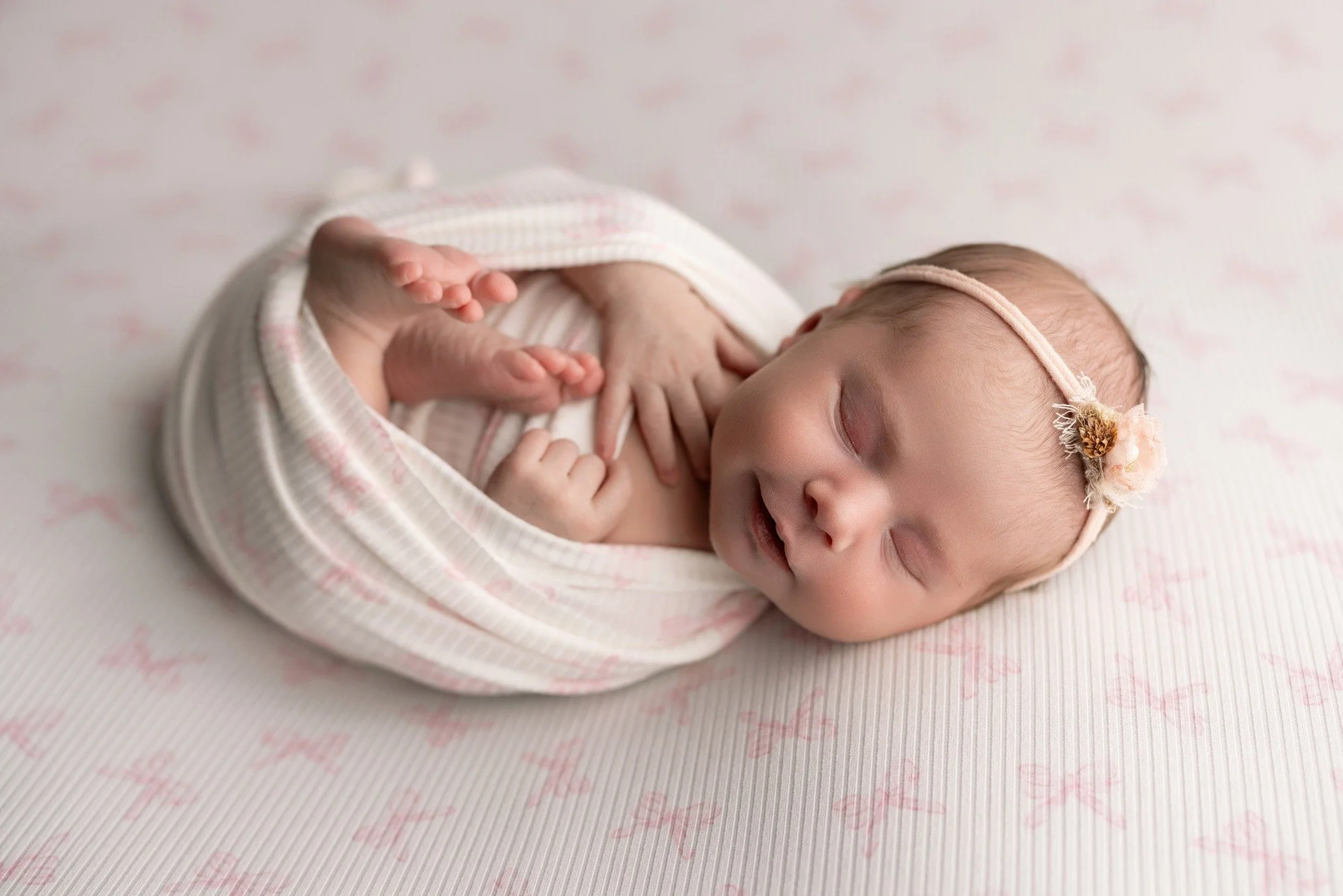 Oh those cheeks and that grin! Who else loves all things girly and bows!?