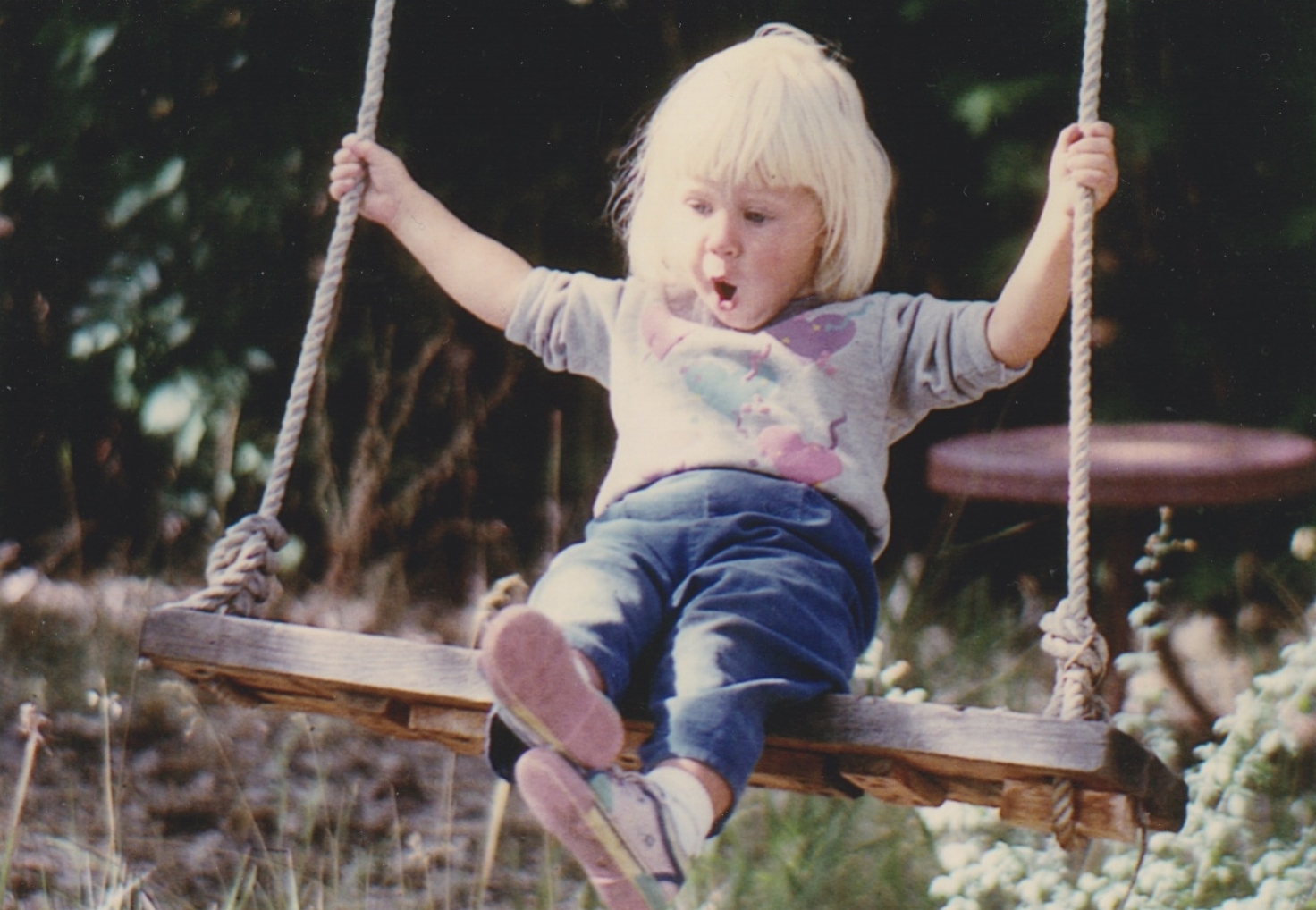 This is my favorite photo of myself as a small child. I don't remember this moment, but I can imagine how I felt - totally independent and free! A little bitty kid on a great big swing. This picture feels like childhood to me. 