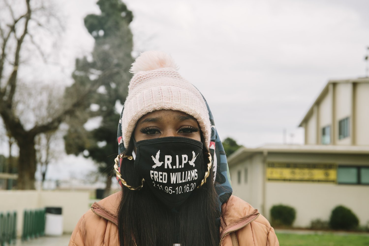  Fred William’s girlfriend stands at a protest against the police who killed Fred Williams, shooting him in the back as he ran away in Willowbrook, Los Angeles, in October of 2020.  