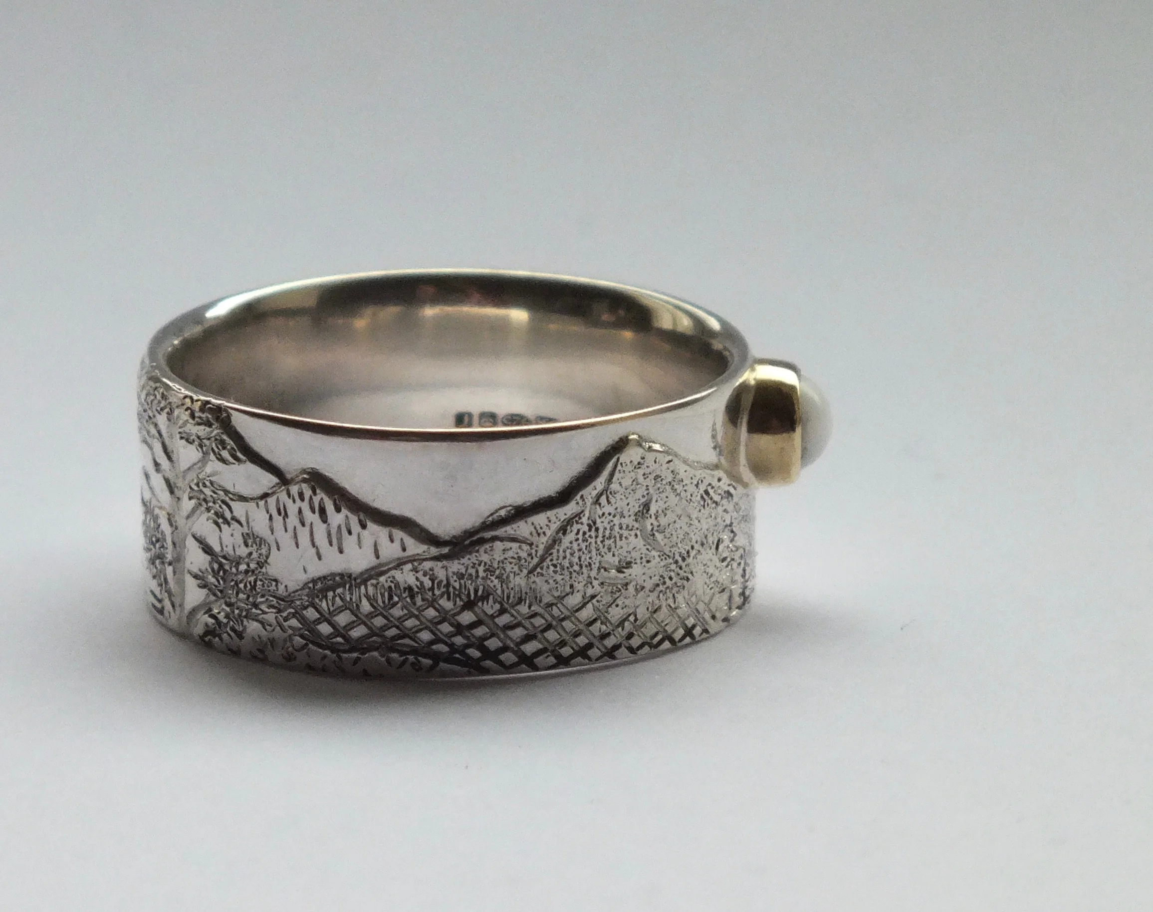 Chased and engraved ring of Oregon landscape with pearl, private commission