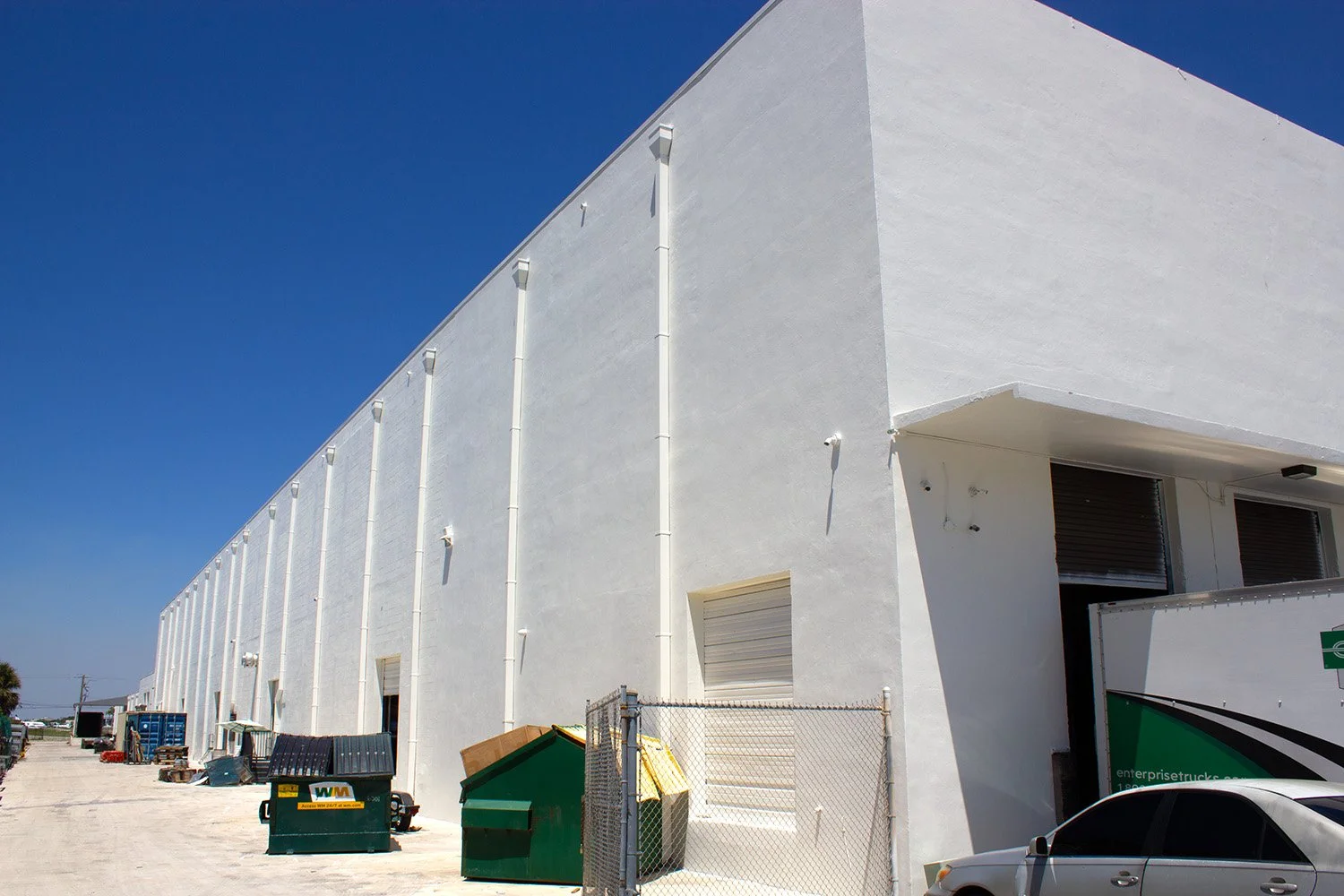 Commercial Building Painted with Acrylux Paint in South Florida Greek Villa Paint Job.jpg