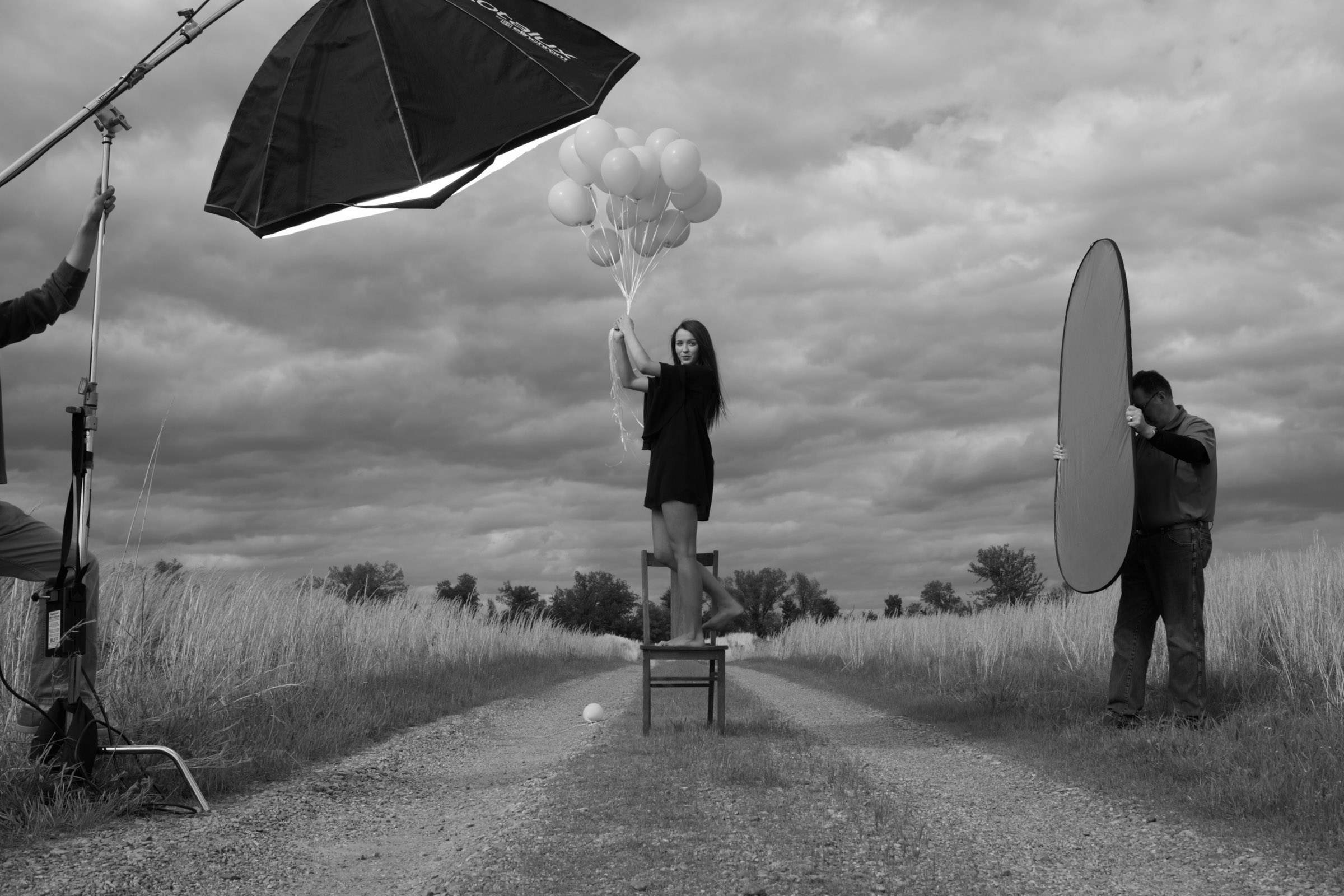 Photo 1 / Photograph from the beginning of the shoot of the balloons used in the final image before they became tangled from the wind.