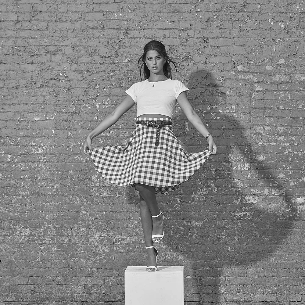 Photo 3 / Photograph of Shelby Sokolik used for the final image, a separate pic was used for the back ground and shadows were modified.