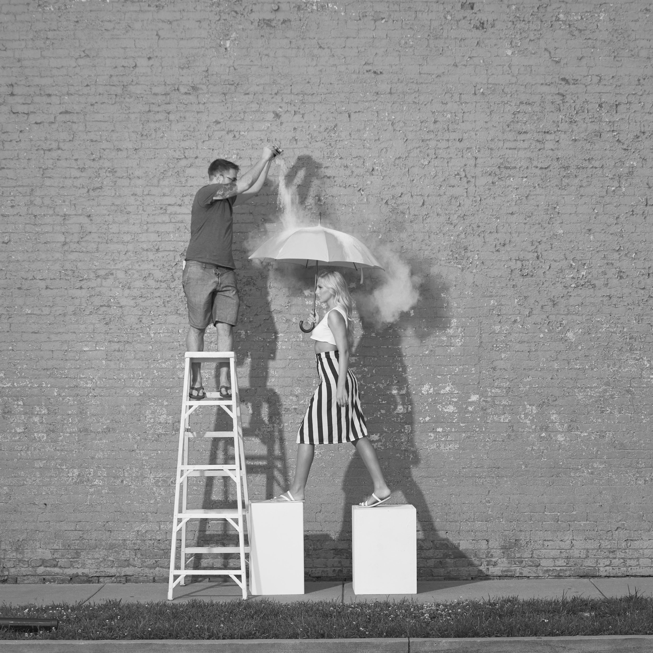 Photo 2 / Photograph wth Ellie Brower specifically to properly capture the motion of the powder across the umbrella. Both the top of the umbrella and powder from this photograph were used.