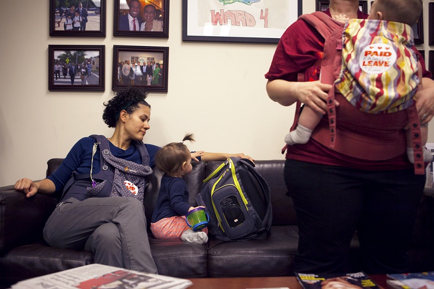 Zaida Espada and her 11 month-old daughter Zoe helped deliver petitions and personal stories to the D.C. Council on Thursday in support of the DC Universal Paid Leave Act. (Emily Jan / National Journal)
