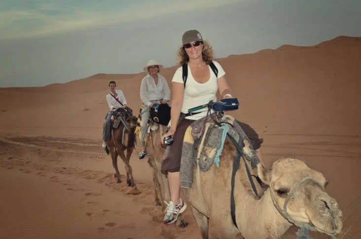 Riding Camels in Morocco after a night under the starts.