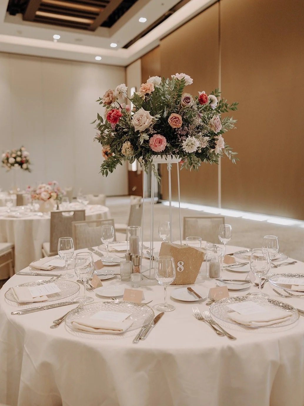 Wedding reception table with tall floral centerpiece designed by 1209 Creative at Camelback Inn in Phoenix Arizona, featuring romantic florals and refined event styling