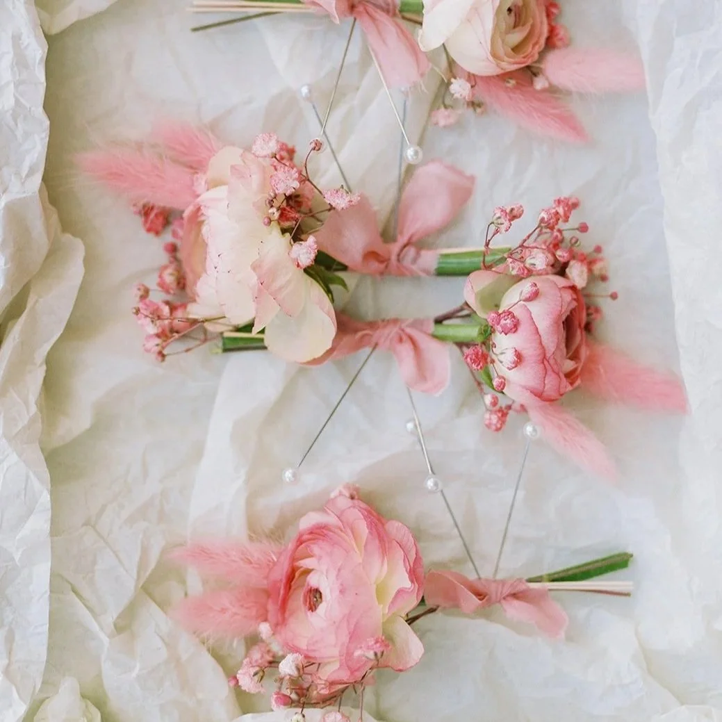 Pink wedding boutonnieres and floral details at Omni Scottsdale Resort designed by 1209 Creative, a Scottsdale wedding florist