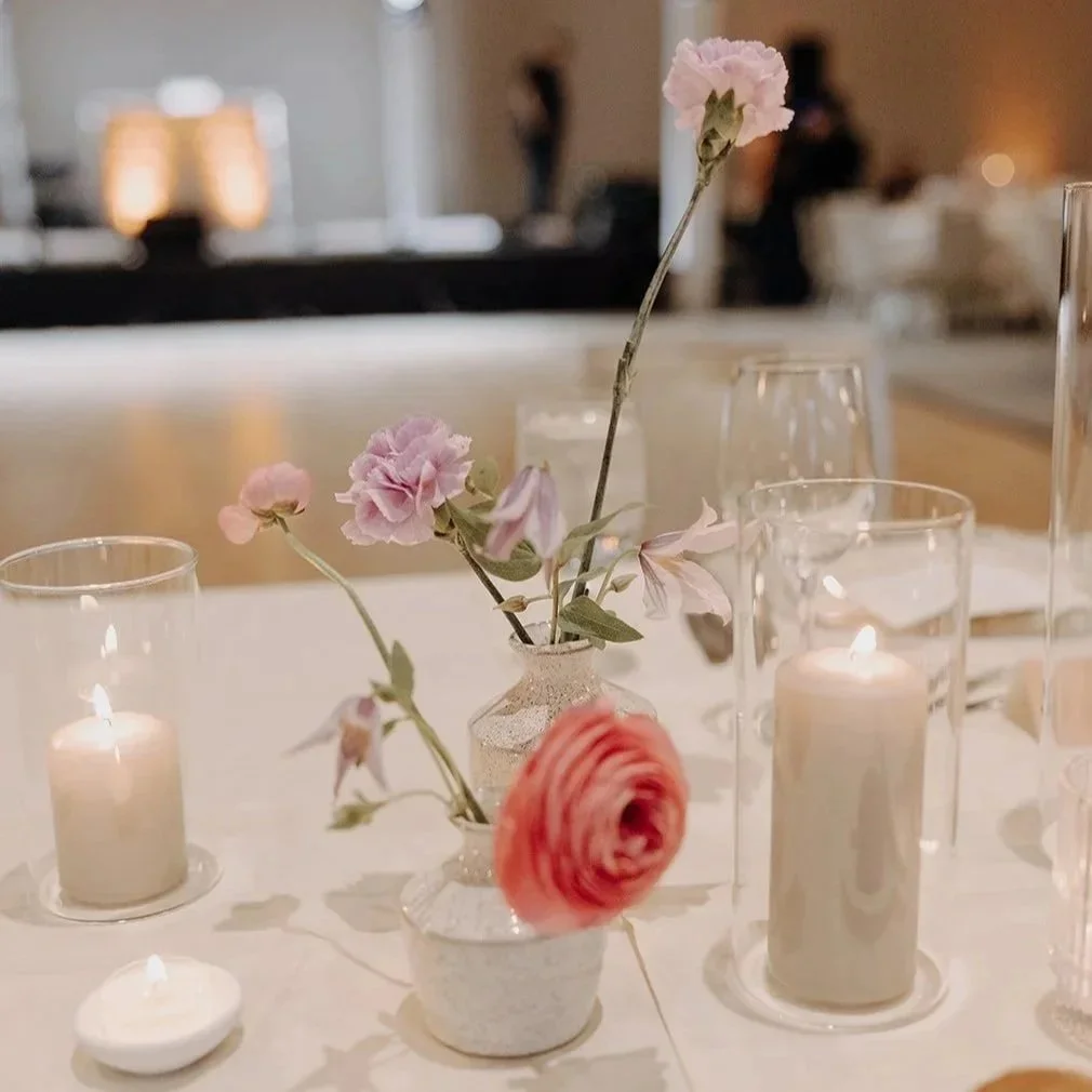 Wedding reception table with bud vase centerpieces and candlelight designed by 1209 Creative at Camelback Inn in Phoenix Arizona, styled with modern editorial florals