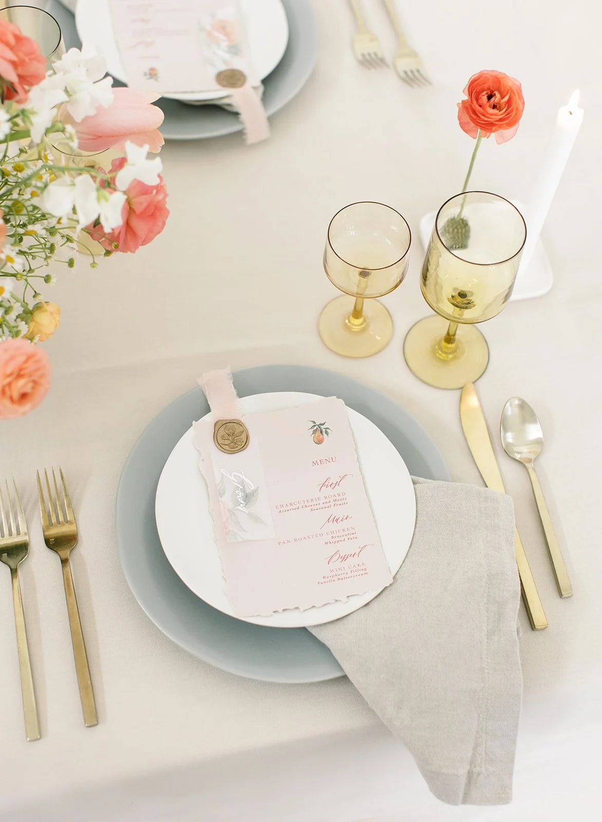 Wedding place setting with menu card, gold flatware, and floral accents designed by 1209 Creative at Providence Vineyard in Hebron Illinois, styled with a refined editorial aesthetic