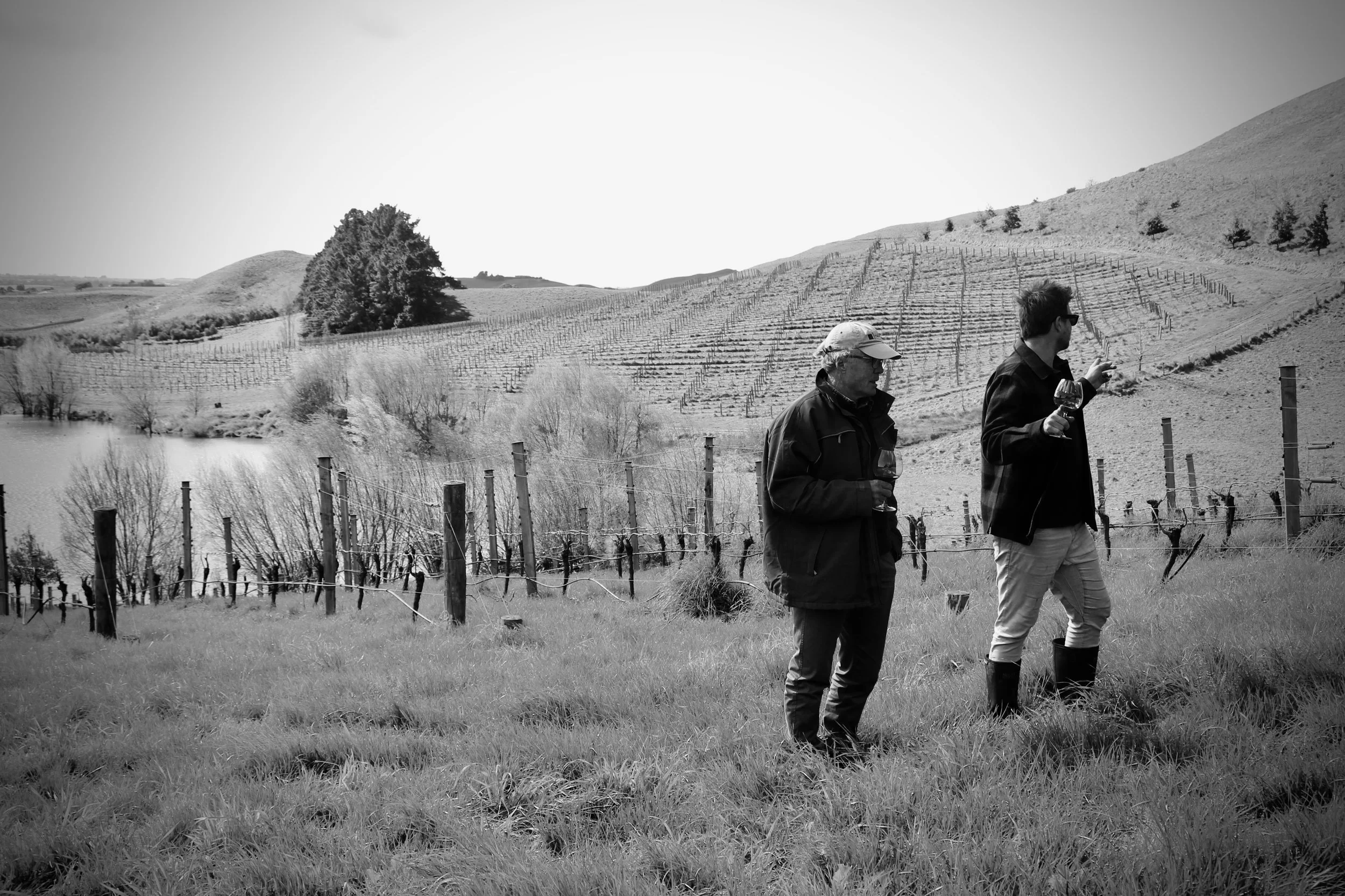 Adam of Fromm talking with certified organic contract grower, Andrew about a special block