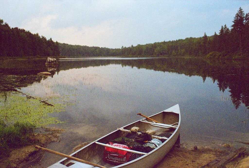 Preparing the canoe to haul gear across the pond. 