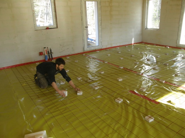 Preparing for the concrete floor; Stego vapor barrier and remesh. 