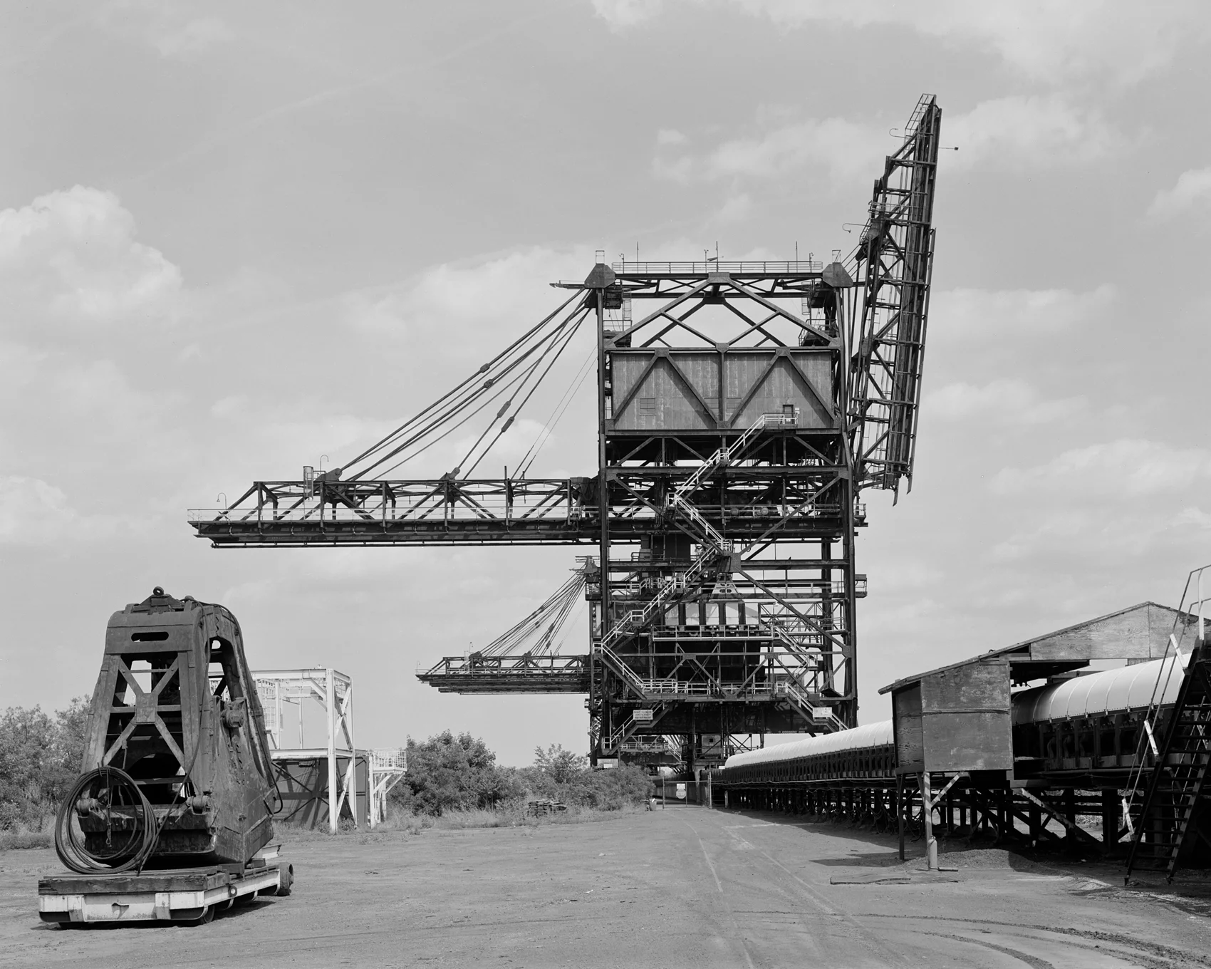 View looking East, Pier 122: this view illustrates the massive ore unloading cranes that have recently been removed from the former PRR facility.