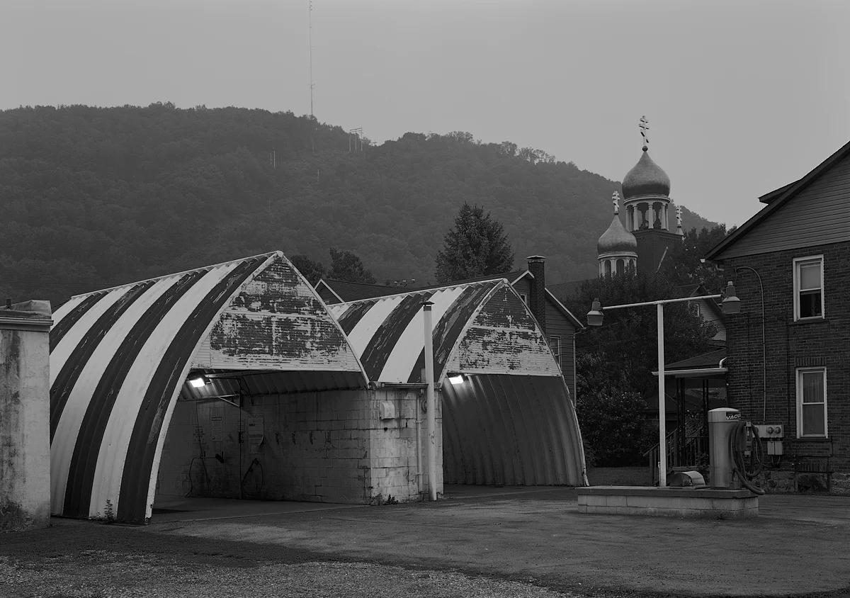 Car Wash and St. John the Baptist Church from Jasper Alley.