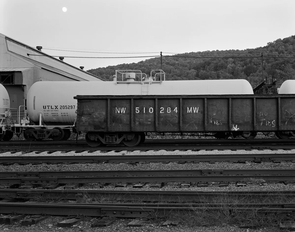 Various freight cars waiting for work at the Franklin Railcar America facility .