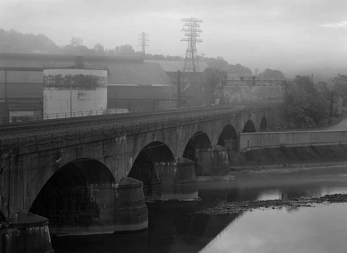 Eastward View of Bridge 222 from Brownstone Hill, note the reinforced concrete facade from the later expansion to a four track mainline system. This bridge continues to serve Norfolk Southern today and is planned to be restored/ refinished as an anchor for the Johnstown Discovery Network system.