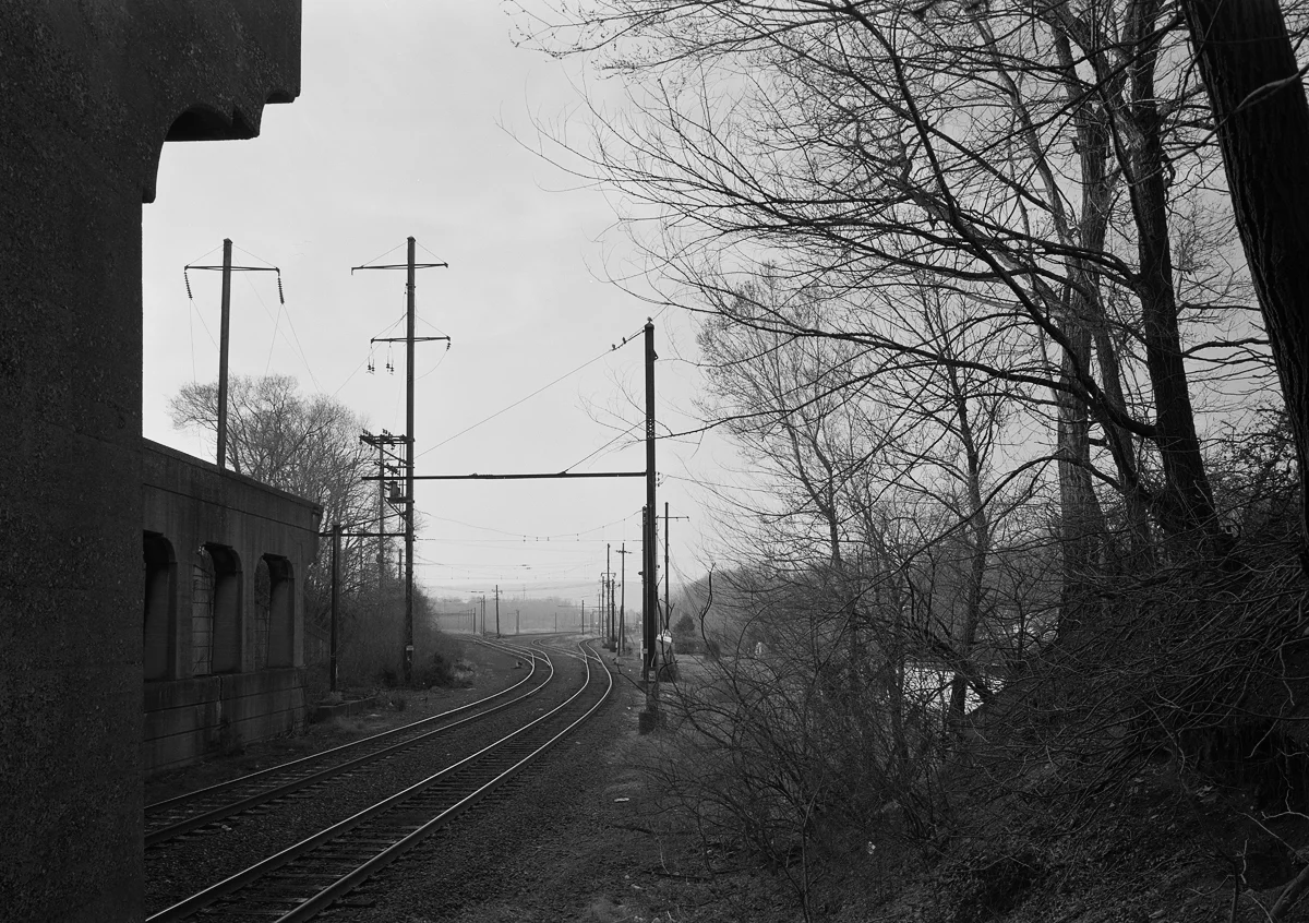 View north of Baltimore Old Line tracks, now the only remaining tracks that enter the yard from Norfolk Southern's Enola Branch. Note the remains of the foundation between the catenary poles on the left side of the image, directly in front of the US 11/15 overpass. This is the only remaining evidence of the PRR's Day tower that once controlled the busy south end of the yard.