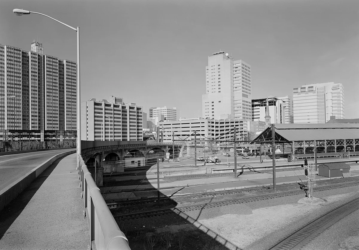 Current view of the south (railroad east) end of the station bound by the Mulberry Street Viaduct itself a beautiful curved concrete arch bridge. The track curving off from the bottom right is Norfolk Southern's connection with the former Reading Company Lebanon Branch, now part of the busy Harrisburg Line. The track immediately behind that and parallel to the station is the Royalton Branch which provides freight an alternate route off the Port Road via Shocks Mill, running alongside Amtrak's Keystone Line west of Roy Interlocking.