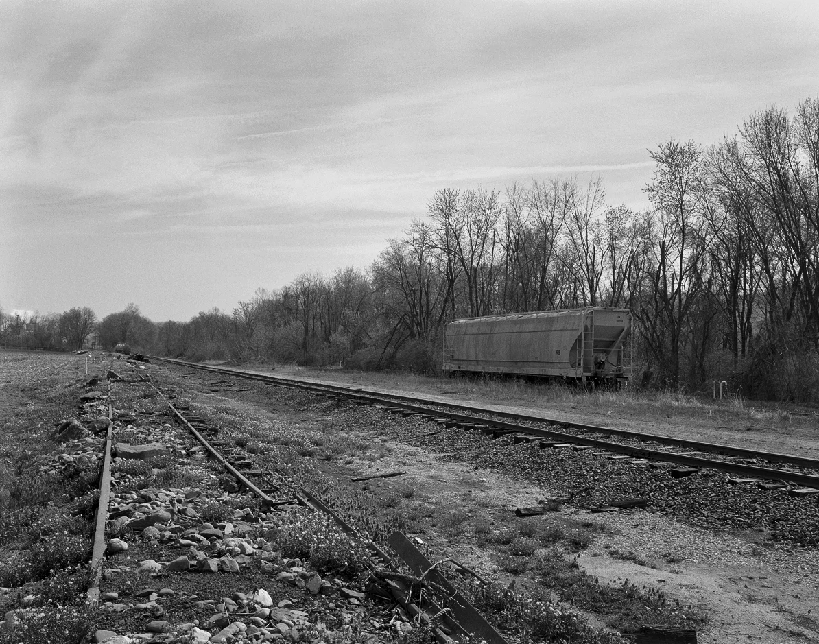 Remaining trackage from the old Harrisburg, Portsmouth, Mount Joy and Lancaster Railroad's Royalton - Columbia Branch, now an industrial track retained to serve a few local customers. The active 1902 York Haven line alignment is out of view to the to right on an elevated fill to accommodate trains off the Shocks Mill Bridge .