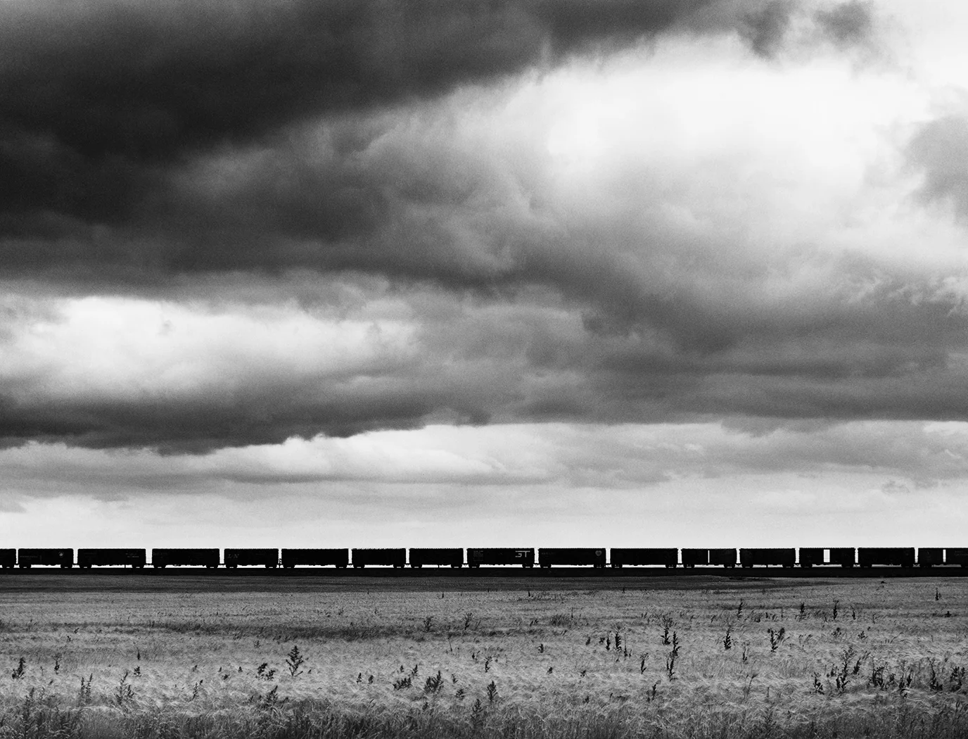 Great Northern Railway. Westbound freight train, west of Havre, Montana, 1968 by noted photographer David Plowden is one of roughly 80 photographs in the exhibition titled, All Aboard! Railroads and the Historic Landscape they Travel.