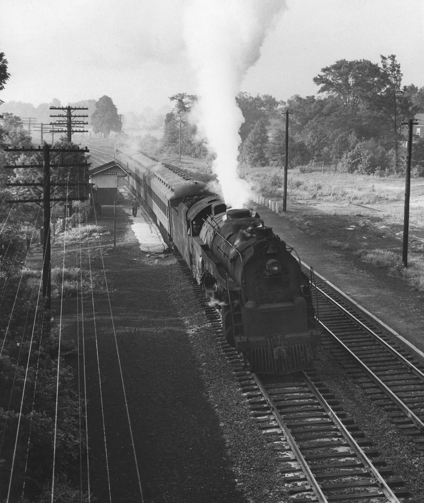 In the Summer of 1954 PRSL local 656 pauses at the Kirkwood Station led by a Reading G class Pacific. Note the depot on the southbound side has been demolished since the view above in 1950. Photography by Robert L. Long, Collection of William Gindhart