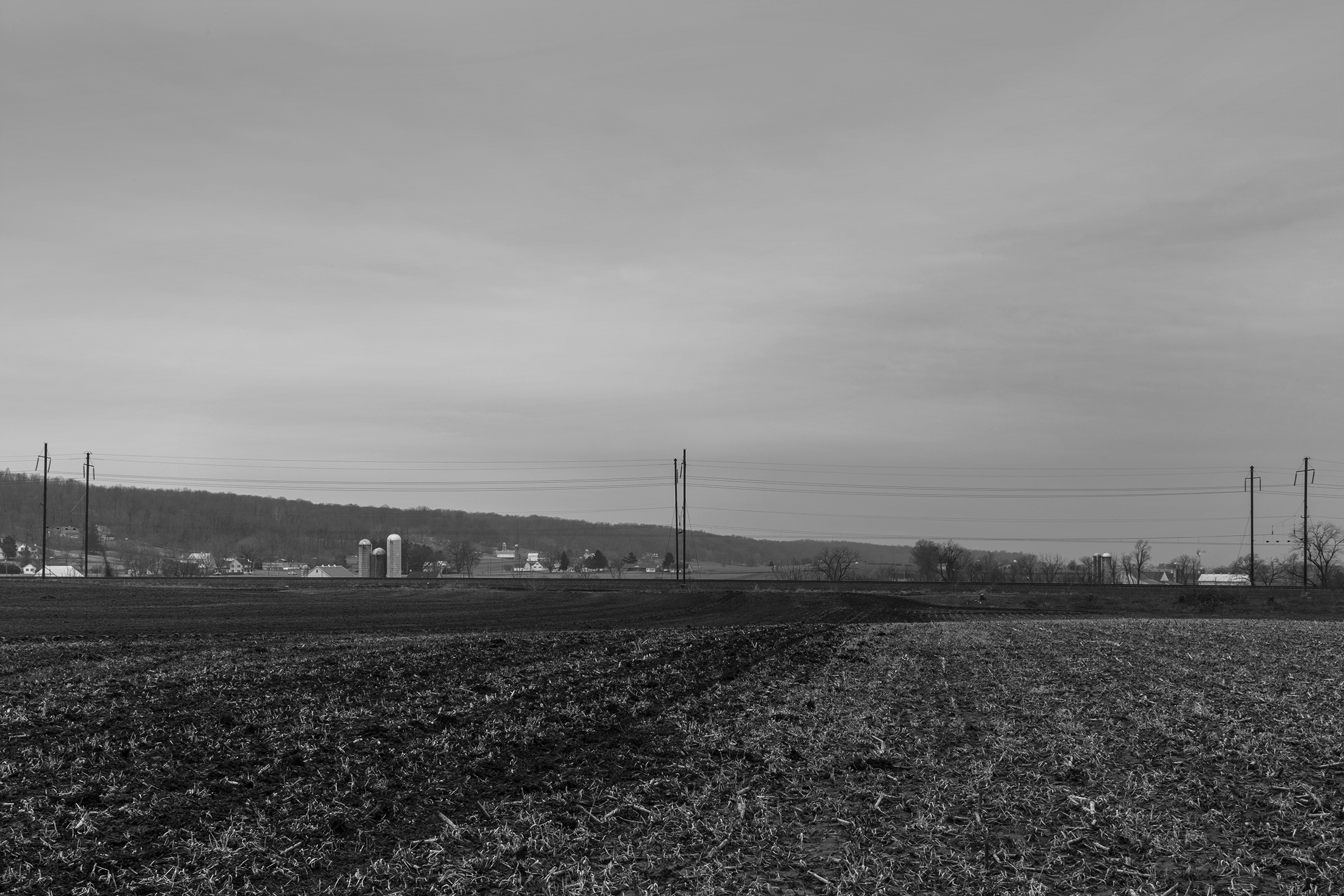 With Mine Ridge in the distance a fill carries the main line towards the summit from the west as it crosses between the Pequea and Chester Valleys. This area defined the ruling grade on the main line of the Philadelphia Division and continues to be the most challenging part of Amtrak's Keystone line. 